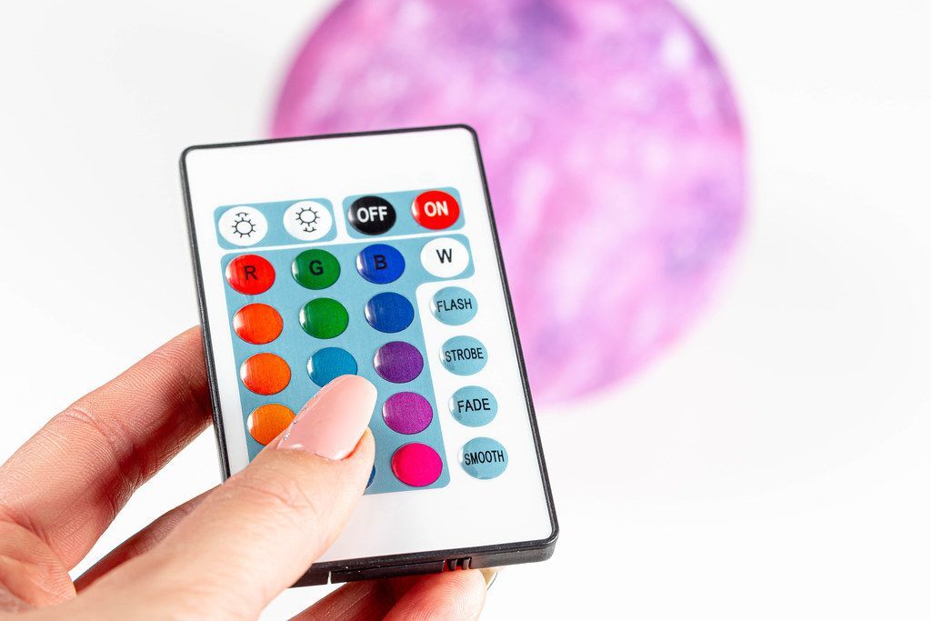 Night light in the form of a shining moon on a wooden stand - Creative ... Night light in the form of a shining moon on a wooden stand - Creative ...